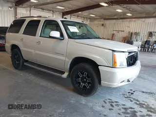 2005 Cadillac Escalade z VIN 1GYEK63N85R204486, wystawiony jako IAAI lot #41785043 z przebiegiem 154 075 mil mil oraz . Historia ofert i sprzedaży dostępna na DreamBid. Obrazek 1.