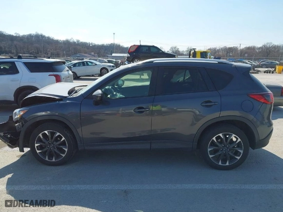 2016 Mazda CX-5 Grand Touring with VIN JM3KE4DY5G0837958, listed as a IAAI auction lot 41713313 with NaN miles. Bid and sale history available at carsss.com. Image 14.