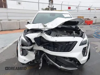 2022 Cadillac XT4 FWD Premium Luxury with VIN 1GYFZCR49NF100393, listed as a IAAI auction lot 42497187 with 23,672 mi miles and . Bid and sale history available at DreamBid. Image 12.