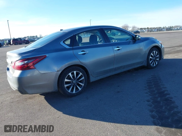 2016 Nissan Altima SV with VIN 1N4AL3AP9GC167612, listed as a IAAI auction lot 41694227 with 102,460 mi miles and . Bid and sale history available at DreamBid. Image 4.