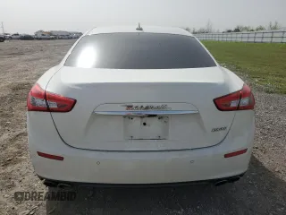 2017 Maserati Ghibli with VIN ZAM57XSA6H1233933, listed as a Copart auction lot 49089525 with 76,965 mi miles and Salvage Title. Bid and sale history available at carsss.com. Image 6.