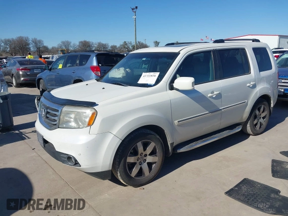 2012 Honda Pilot Touring with VIN 5FNYF3H91CB020673, listed as a IAAI auction lot 41721836 with 123,607 mi miles and . Bid and sale history available at carsss.com. Image 17.