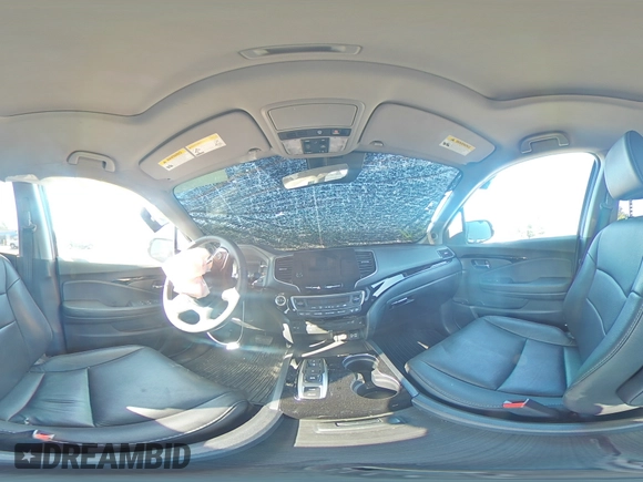 2020 Honda Pilot Touring 8-Passenger with VIN 5FNYF5H95LB021658, listed as a Copart auction lot 58878594 with 36,122 mi miles and Salvage Title. Bid and sale history available at DreamBid. Image 13.