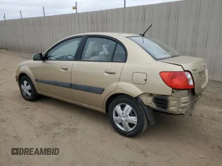 2009 Kia Rio LX with VIN KNADE223496549097, listed as a Copart auction lot 54375975 with 140,882 mi miles and Salvage Title. Bid and sale history available at DreamBid. Image 2.