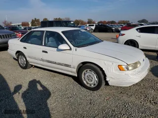 1993 Ford Taurus GL with VIN 1FALP5247PG143248, listed as a Copart auction lot 83922634 with 605,096 mi miles and Salvage Title. Bid and sale history available at carsss.com. Image 4.