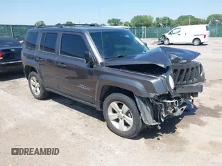 2014 Jeep Patriot Latitude with VIN 1C4NJRFB4ED799037, listed as a IAAI auction lot 42458807 with 105,936 mi miles and . Bid and sale history available at DreamBid. Image 1.