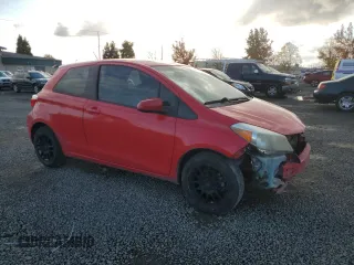 2013 Toyota Yaris L with VIN JTDJTUD30DD571316, listed as a Copart auction lot 77884944 with 243,010 mi miles and Salvage Title. Bid and sale history available at carsss.com. Image 4.