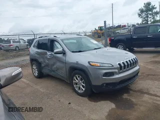 2016 Jeep Cherokee Latitude z VIN 1C4PJLCBXGW217640, wystawiony jako IAAI lot #42170597 z przebiegiem 109 875 mil mil oraz . Historia ofert i sprzedaży dostępna na DreamBid. Obrazek 1.