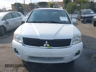 2011 Mitsubishi Endeavor LS with VIN 4A4JN2AS7BE028071, listed as a IAAI auction lot 41391634 with 149,070 mi miles. Bid and sale history available at carsss.com. Image 12.