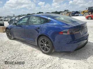2021 Tesla Model S Long Range с VIN 5YJSA1E50MF452893, выставлен на аукционе Copart как лот 54139865 с пробегом 56 410 миль миль и Списание • Salvage title. История ставок и продаж доступна на DreamBid. Изображение 2.