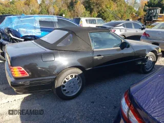 1997 Mercedes-Benz SL-Class with VIN WDBFA67F9VF146887, listed as a Copart auction lot 77166464 with 0 mi miles and Salvage Title. Bid and sale history available at carsss.com. Image 3.