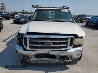 2001 Ford Super Duty F-250 XL with VIN 1FTNX20L01EC17379, listed as a Copart auction lot 74730024 with 309,556 mi miles and Salvage Title. Bid and sale history available at carsss.com. Image 5.
