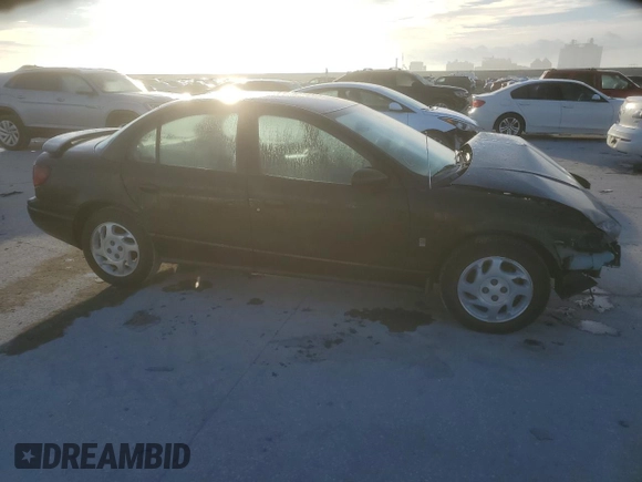 2001 Saturn SL z VIN 1G8ZK52741Z336816, wystawiony jako Copart lot #46798005 z przebiegiem 153 642 mil mil oraz Szkoda całkowita • Salvage title. Historia ofert i sprzedaży dostępna na DreamBid. Obrazek 4.