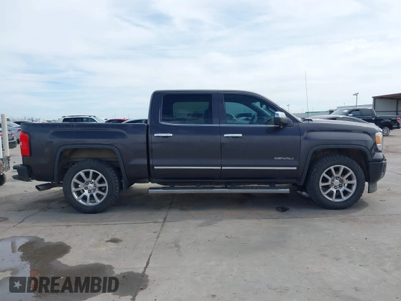 2015 GMC Sierra 1500 Denali with VIN 3GTU2WEJ2FG509236, listed as a IAAI auction lot 41771790 with 219,043 mi miles. Bid and sale history available at carsss.com. Image 13.