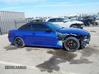 2024 BMW 4 Series M440i with VIN WBA53AT0XRCP39898, listed as a IAAI auction lot 41583884 with 2,212 mi miles and . Bid and sale history available at carsss.com. Image 14.