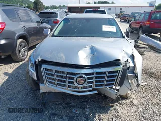 2013 Cadillac XTS Luxury z VIN 2G61R5S38D9228339, wystawiony jako IAAI lot #42664948 z przebiegiem 105 917 mil mil oraz . Historia ofert i sprzedaży dostępna na DreamBid. Obrazek 13.