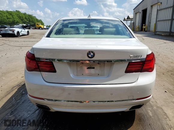 2014 BMW 7 Series 740i z VIN WBAYA6C51ED144132, wystawiony jako Copart lot #55131365 z przebiegiem 116 826 mil mil oraz Szkoda całkowita • Salvage title. Historia ofert i sprzedaży dostępna na DreamBid. Obrazek 6.