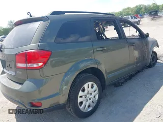 2019 Dodge Journey SE with VIN 3C4PDCBB4KT732026, listed as a IAAI auction lot 42177975 with Not provided miles and . Bid and sale history available at DreamBid. Image 4.