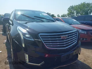 2017 Cadillac XT5 Platinum AWD with VIN 1GYKNFRS6HZ130626, listed as a IAAI auction lot 42470536 with 128,129 mi miles and . Bid and sale history available at DreamBid. Image 6.