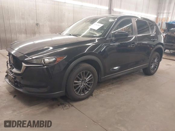 2020 Mazda CX-5 Touring with VIN JM3KFBCM9L1785125, listed as a IAAI auction lot 41983561 with 101,062 mi miles and . Bid and sale history available at carsss.com. Image 18.