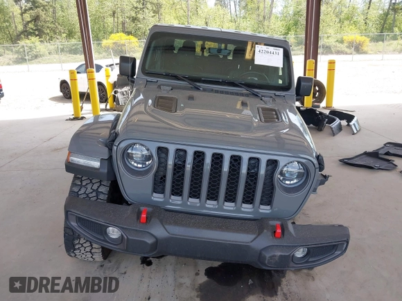 2022 Jeep Gladiator Rubicon with VIN 1C6JJTBG6NL166081, listed as a IAAI auction lot 42204431 with 40,568 mi miles and . Bid and sale history available at DreamBid. Image 13.