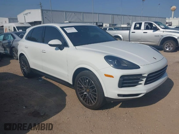 2019 Porsche Cayenne z VIN WP1AA2AYXKDA12829, wystawiony jako IAAI lot #42050935 z przebiegiem 80 056 mil mil oraz . Historia ofert i sprzedaży dostępna na DreamBid. Obrazek 1.