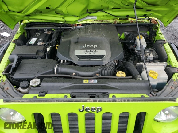 2012 Jeep Wrangler Sport with VIN 1C4AJWAG2CL233722, listed as a Copart auction lot 61125095 with 49,864 mi miles and Salvage title. Bid and sale history available at DreamBid. Image 11.
