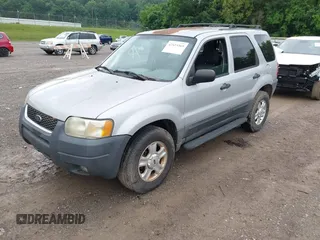 2003 Ford Escape XLT Popular z VIN 1FMYU03193KB02834, wystawiony jako IAAI lot #42423365 z przebiegiem 350 065 mil mil oraz . Historia ofert i sprzedaży dostępna na DreamBid. Obrazek 2.