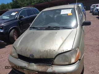 2002 Toyota ECHO z VIN JTDAT123920224086, wystawiony jako IAAI lot #42329376 z przebiegiem 120 108 mil mil oraz . Historia ofert i sprzedaży dostępna na DreamBid. Obrazek 6.
