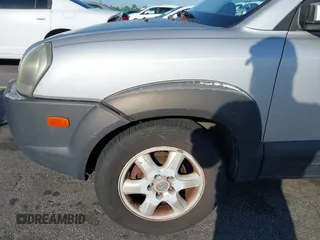 2005 Hyundai Tucson GLS with VIN KM8JN12D65U244033, listed as a IAAI auction lot 41998302 with 219,205 mi miles. Bid and sale history available at carsss.com. Image 6.