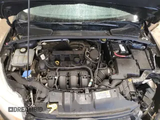 2012 Ford Focus SE z VIN 1FAHP3K24CL407570, wystawiony jako Copart lot #56002135 z przebiegiem 122 730 mil mil oraz Szkoda całkowita • Salvage title. Historia ofert i sprzedaży dostępna na DreamBid. Obrazek 11.