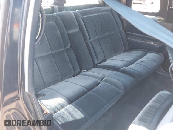 1986 Cadillac DeVille z VIN 1G6CD4783G4204155, wystawiony jako IAAI lot #42229194 z przebiegiem 131 360 mil mil oraz . Historia ofert i sprzedaży dostępna na DreamBid. Obrazek 8.