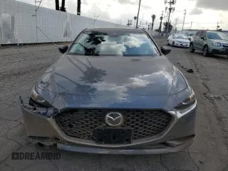 2024 Mazda 3 S Carbon Edition with VIN 3MZBPBCM0RM403689, listed as a Copart auction lot 54277935 with 7,040 mi miles and Salvage Title. Bid and sale history available at DreamBid. Image 5.