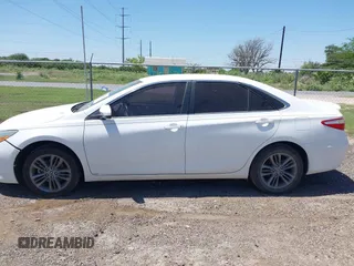 2015 Toyota Camry XLE with VIN 4T1BF1FK2FU895574, listed as a IAAI auction lot 41993588 with 107,377 mi miles. Bid and sale history available at carsss.com. Image 14.