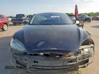 2014 Tesla Model S 60 с VIN 5YJSA1H16EFP50018, выставлен на аукционе Copart как лот 64372605 с пробегом 165 910 миль миль и Списание • Salvage title. История ставок и продаж доступна на DreamBid. Изображение 5.