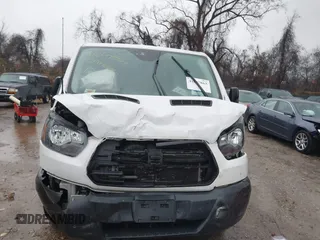2017 Ford Transit z VIN 1FTYR1ZM2HKA27107, wystawiony jako IAAI lot #41047863 z przebiegiem 87 219 mil mil oraz . Historia ofert i sprzedaży dostępna na DreamBid. Obrazek 12.
