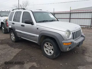 2004 Jeep Liberty Sport with VIN 1J4GL48K74W318861, listed as a IAAI auction lot 41706222 with 211,089 mi miles. Bid and sale history available at carsss.com. Image 1.
