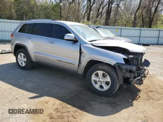 2017 Jeep Grand Cherokee Laredo with VIN 1C4RJEAG8HC867959, listed as a Copart auction lot 50133885 with 167,671 mi miles and Salvage Title. Bid and sale history available at carsss.com. Image 4.