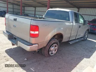 2005 Ford F-150 XLT with VIN 1FTPX14525NA78019, listed as a IAAI auction lot 41932381 with 170,153 mi miles. Bid and sale history available at carsss.com. Image 4.