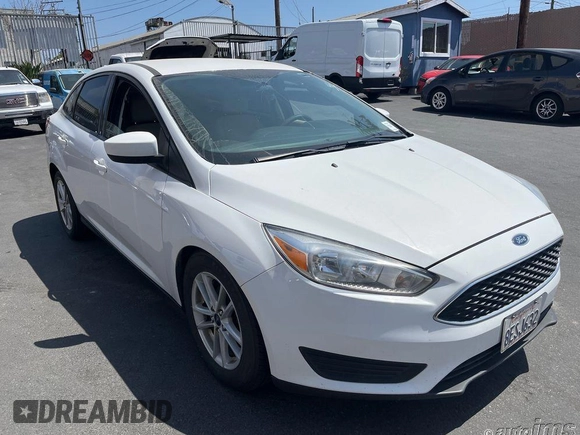 2018 Ford Focus SE z VIN 1FADP3F20JL259181, wystawiony jako IAAI lot #42400276 z przebiegiem 161 473 mil mil oraz . Historia ofert i sprzedaży dostępna na DreamBid. Obrazek 14.