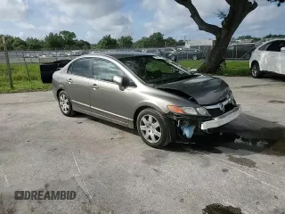2006 Honda Civic LX z VIN JHMFA16506S006537, wystawiony jako Copart lot #60407425 z przebiegiem 171 482 mil mil oraz Szkoda całkowita • Salvage title. Historia ofert i sprzedaży dostępna na DreamBid. Obrazek 14.
