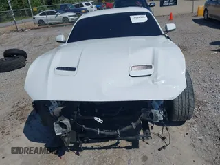 2018 Ford Mustang EcoBoost z VIN 1FA6P8TH2J5112959, wystawiony jako IAAI lot #42110990 z przebiegiem 97 088 mil mil oraz . Historia ofert i sprzedaży dostępna na DreamBid. Obrazek 12.