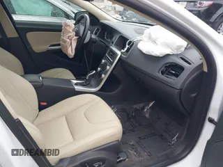 2017 Volvo S60 Inscription with VIN LYV402HKXHB148240, listed as a IAAI auction lot 41618292 with 77,870 mi miles. Bid and sale history available at carsss.com. Image 5.