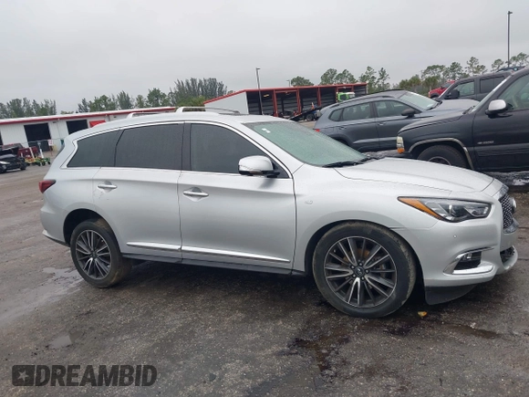 2019 Infiniti QX60 Pure z VIN 5N1DL0MM9KC534133, wystawiony jako IAAI lot #41407744 z przebiegiem 215 402 mil mil oraz . Historia ofert i sprzedaży dostępna na DreamBid. Obrazek 14.