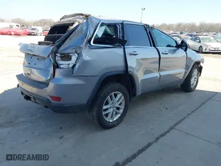 2018 Jeep Grand Cherokee Laredo E with VIN 1C4RJFAG8JC130465, listed as a IAAI auction lot 41789688 with 133,299 mi miles. Bid and sale history available at carsss.com. Image 4.