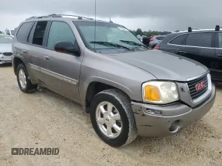 2005 GMC Envoy SLT with VIN 1GKDT13S452307702, listed as a Copart auction lot 74204644 with 0 mi miles and Salvage Title. Bid and sale history available at carsss.com. Image 4.