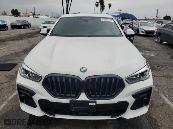 2022 BMW X6 xDrive40i z VIN 5UXCY6C08N9J21980, wystawiony jako Copart lot #48819745 z przebiegiem 24 431 mil mil oraz Szkoda całkowita • Salvage title. Historia ofert i sprzedaży dostępna na DreamBid. Obrazek 5.