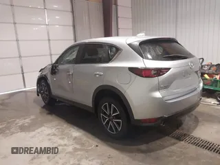 2018 Mazda CX-5 Touring with VIN JM3KFBCM7J0347769, listed as a IAAI auction lot 41611985 with 158,579 mi miles. Bid and sale history available at carsss.com. Image 3.