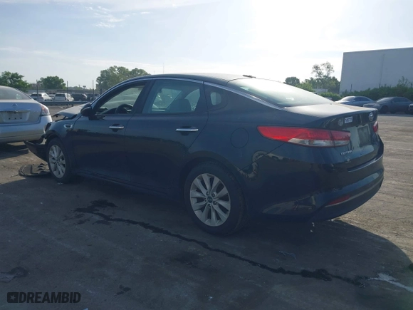 2016 Kia Optima EX with VIN 5XXGU4L3XGG033323, listed as a IAAI auction lot 42088998 with 134,686 mi miles. Bid and sale history available at carsss.com. Image 3.