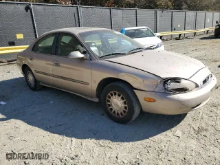 1999 Mercury Sable LS with VIN 1MEFM53S7XG602788, listed as a Copart auction lot 76894294 with 186,315 mi miles and Salvage Title. Bid and sale history available at carsss.com. Image 4.